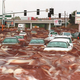 Automobiles are trapped in a deadly swirl of chocolate and vanilla Snak-Tyme pudding.